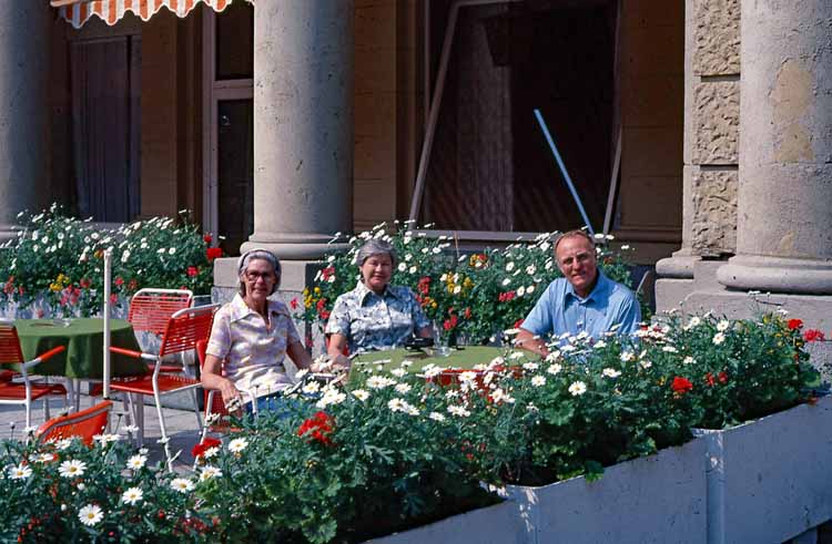 surrounded by flower boxes